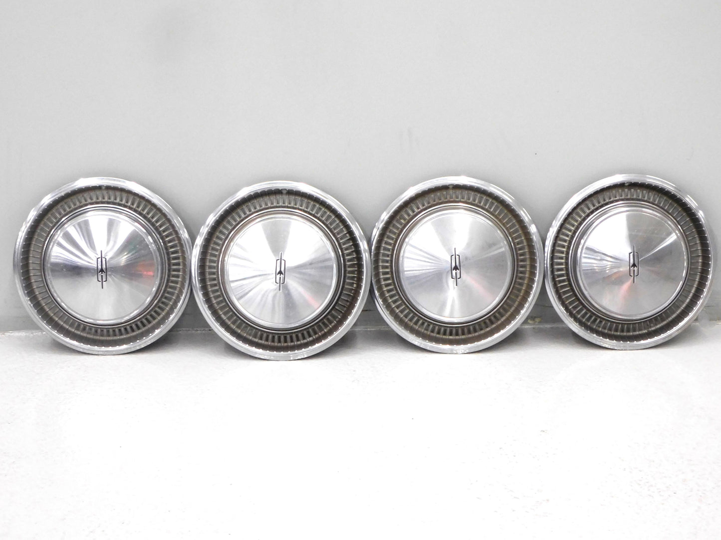 STK 10376 Set of 4 1970s Oldsmobile Hubcaps/Wheel Covers