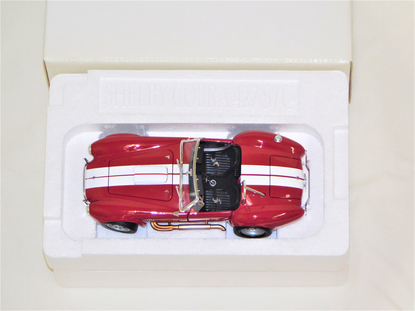 STK 10154  WIX 1965 Red Shelby Cobra 1/24 Die Cast *Price Includes Tax and Shipping within the US*