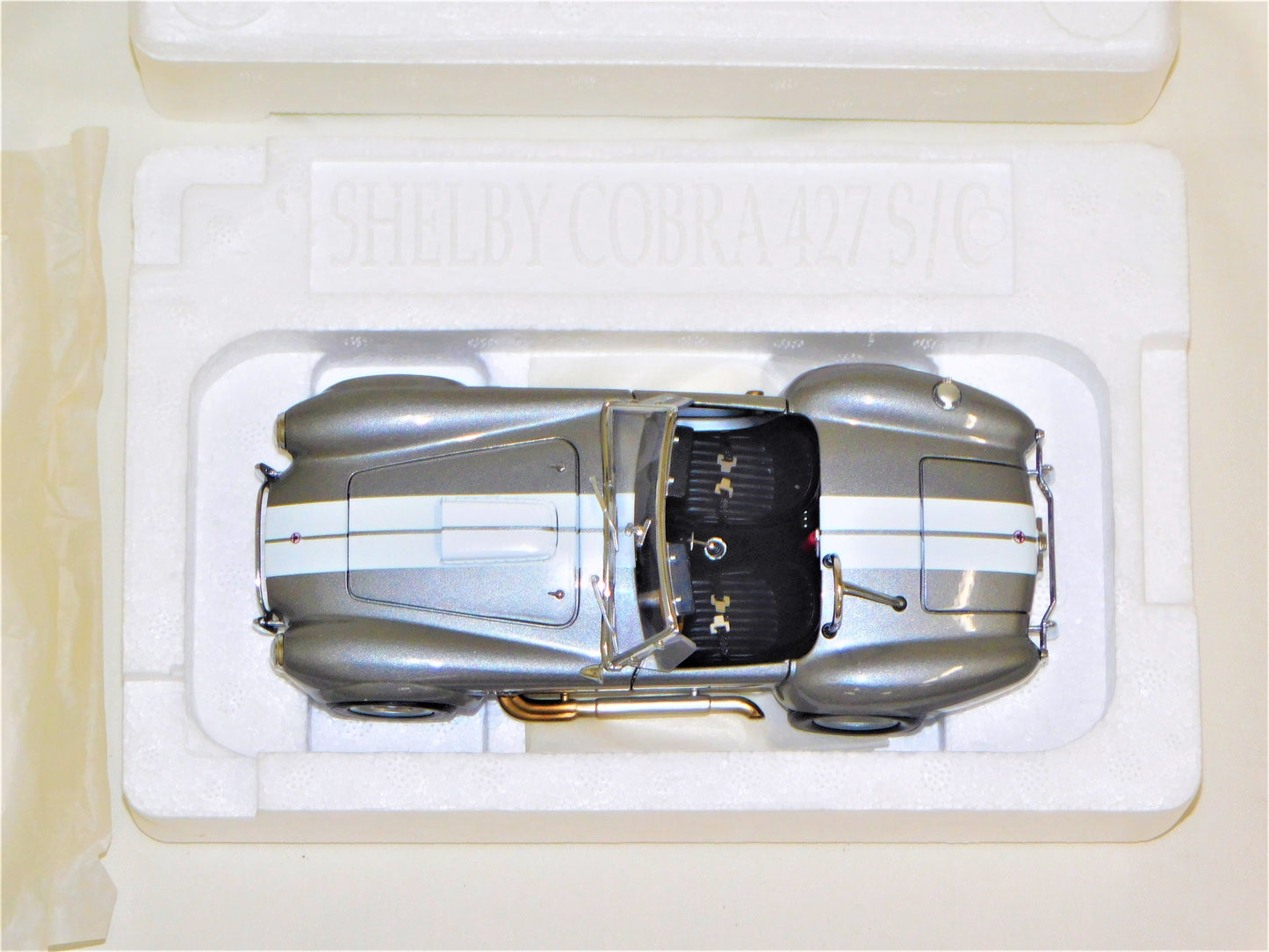 STK 10156  WIX 1965 Dark Grey Metallic Shelby Cobra 1/24 Die Cast *Price Includes Tax and Shipping within the US*