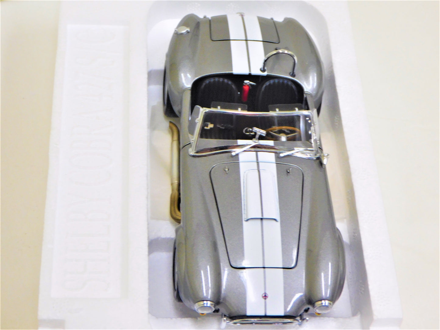 STK 10156  WIX 1965 Dark Grey Metallic Shelby Cobra 1/24 Die Cast *Price Includes Tax and Shipping within the US*