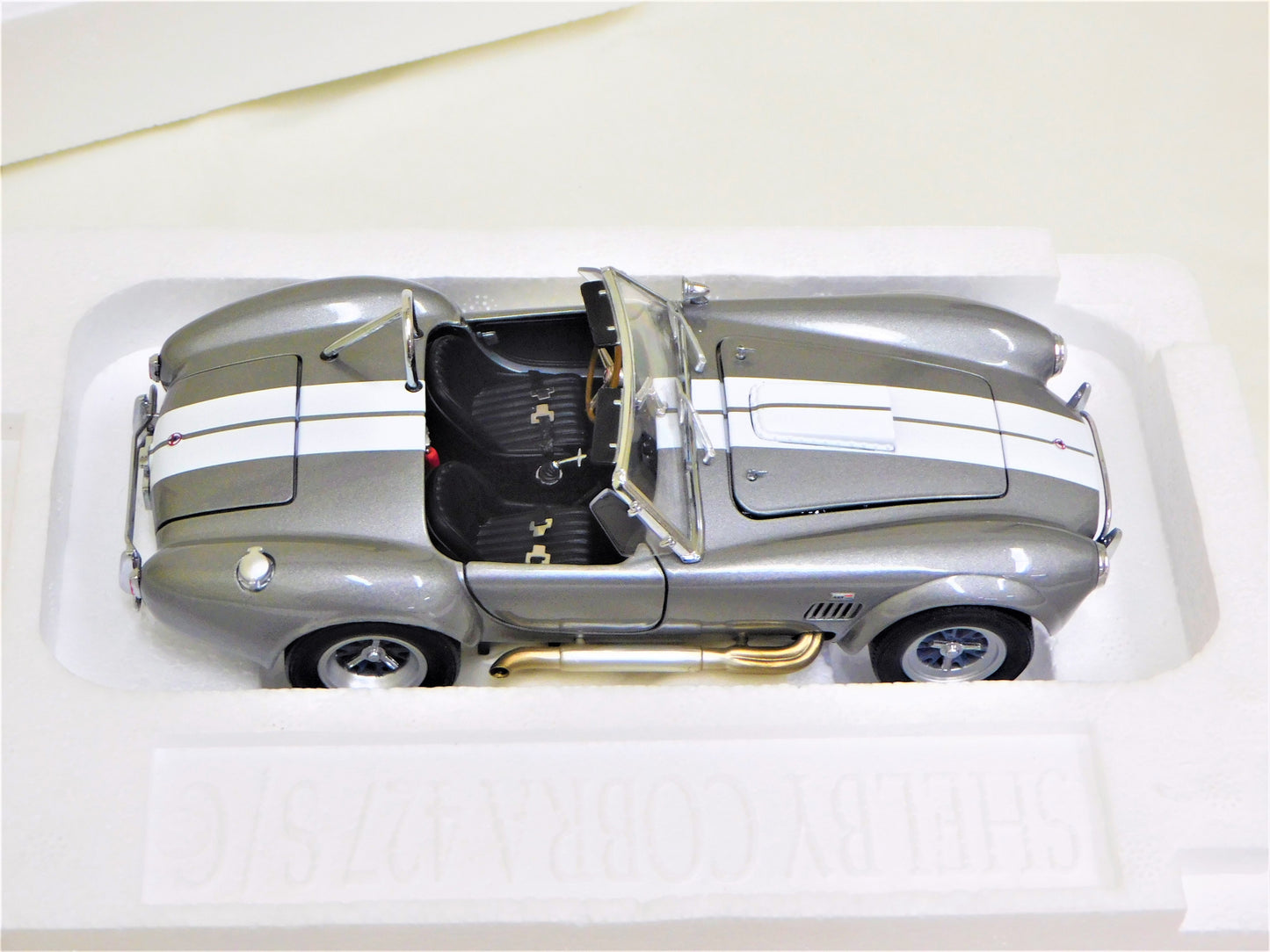 STK 10156  WIX 1965 Dark Grey Metallic Shelby Cobra 1/24 Die Cast *Price Includes Tax and Shipping within the US*