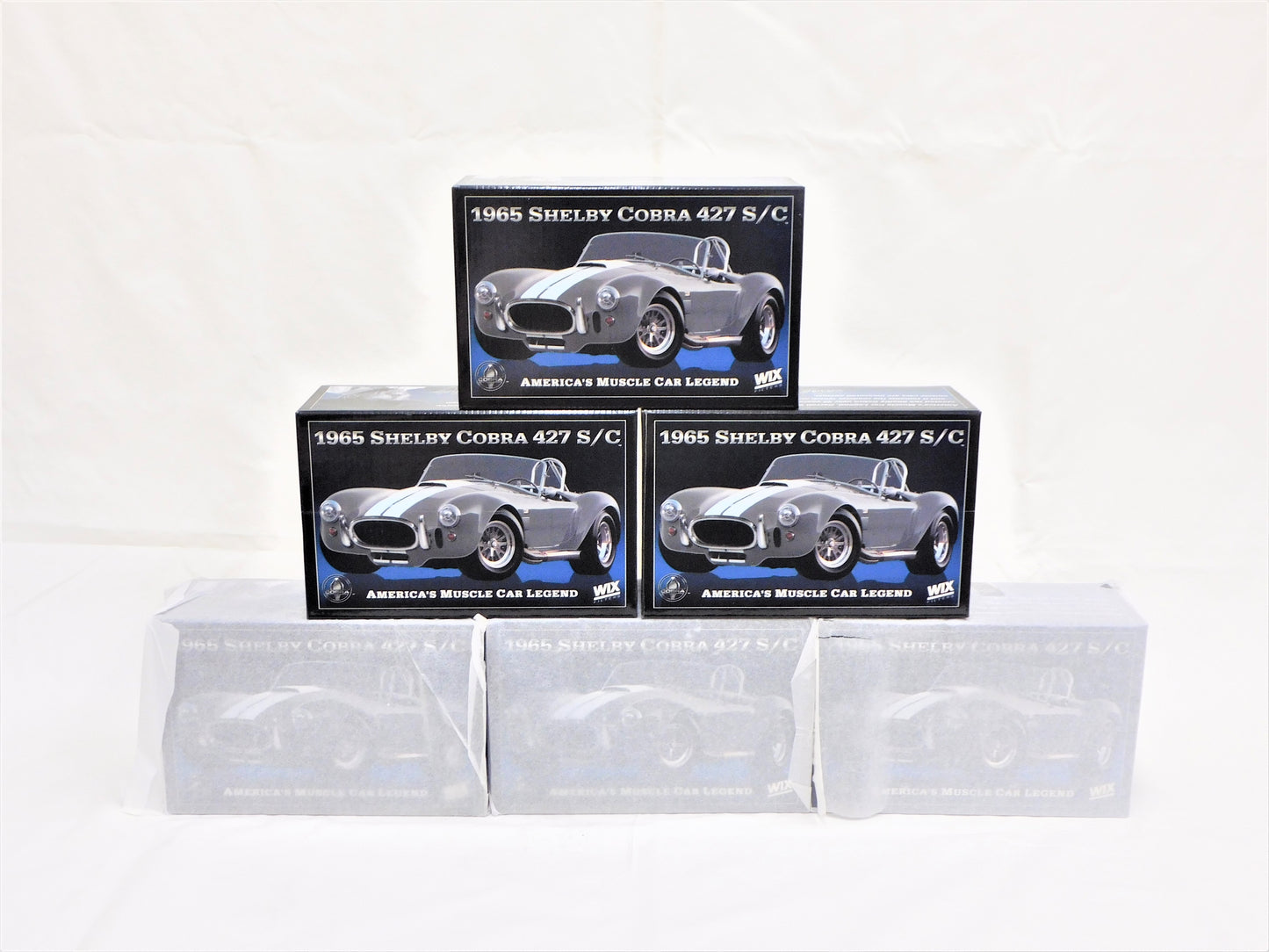 STK 10156  WIX 1965 Dark Grey Metallic Shelby Cobra 1/24 Die Cast *Price Includes Tax and Shipping within the US*