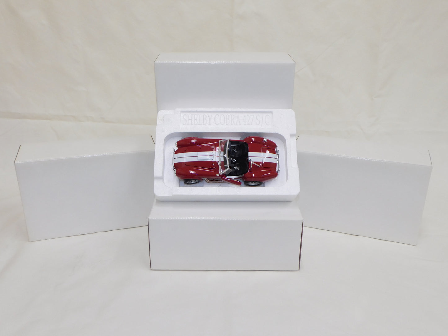 STK 10154  WIX 1965 Red Shelby Cobra 1/24 Die Cast *Price Includes Tax and Shipping within the US*